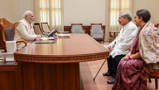 The image shows Smriti Irani and her dad sitting opposite PM Modi. (Instagram/@smritiiraniofficial) The image shows Smriti Irani and her dad sitting opposite PM Modi. (Instagram/@smritiiraniofficial)