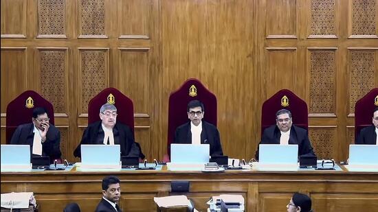 The five-judge bench pronouncing the verdict. (PTI) The five-judge bench pronouncing the verdict. (PTI)