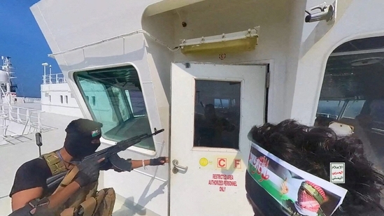 File Photo: Houthi fighters open the door of the cockpit on the ship's deck in the Red Sea in this photo released November 20, 2023.(via REUTERS/Representative Image)