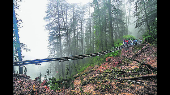 A landslide prompted by incessant rain in Shimla destroys a section of railway track, in August. (PTI) A landslide prompted by incessant rain in Shimla destroys a section of railway track, in August. (PTI)