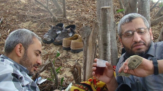 An undated photo released by the Israel Defense Forces shows Muhammed Deif (right), the commander of the Hamas terror group’s military wing. (IDF) An undated photo released by the Israel Defense Forces shows Muhammed Deif (right), the commander of the Hamas terror group’s military wing. (IDF)