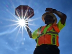 TOPSHOT - Traffic warden Rai Rogers mans his street corner during an 8-hour shift under the hot sun in Las Vegas, Nevada on July 12, 2023, where temperatures reached 106 degrees amid an ongoing heatwave. More than 50 million Americans are set to bake under dangerously high temperatures this week, from California to Texas to Florida, as a heat wave builds across the southern United States. (Photo by Frederic J. BROWN / AFP)(AFP) TOPSHOT - Traffic warden Rai Rogers mans his street corner during an 8-hour shift under the hot sun in Las Vegas, Nevada on July 12, 2023, where temperatures reached 106 degrees amid an ongoing heatwave. More than 50 million Americans are set to bake under dangerously high temperatures this week, from California to Texas to Florida, as a heat wave builds across the southern United States. (Photo by Frederic J. BROWN / AFP)(AFP)