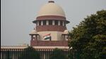 Three of them wrote to the Supreme Court in December, contending that they have been terminated from service in the initial phases of their career (HT File Photo) Three of them wrote to the Supreme Court in December, contending that they have been terminated from service in the initial phases of their career (HT File Photo)