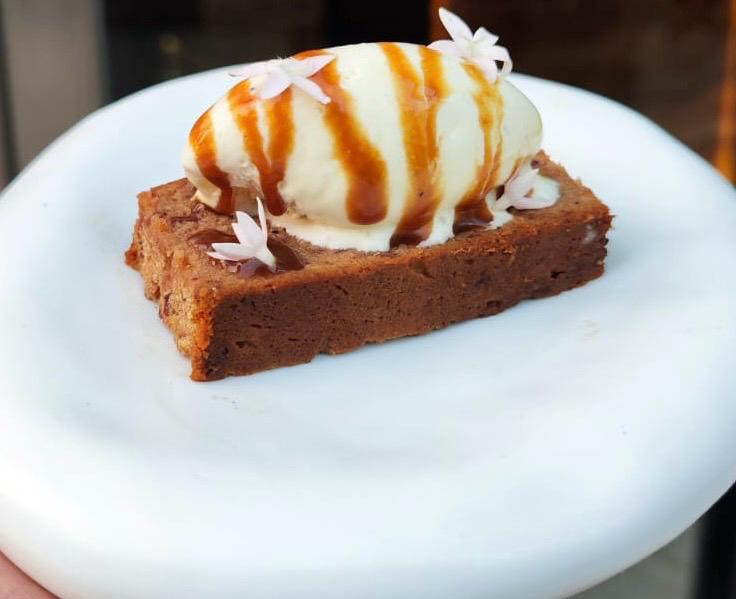 At Masala Library, they serve a tea cake with caramel ice cream At Masala Library, they serve a tea cake with caramel ice cream