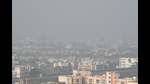 A hazy view of the Noida skyline on Wednesday morning owing to the dense fog and chilly conditions. (Sunil Ghosh/HT Photo) A hazy view of the Noida skyline on Wednesday morning owing to the dense fog and chilly conditions. (Sunil Ghosh/HT Photo)