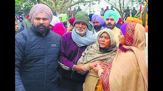 Distraught family members during the cremation ceremony of martyr Ajay Singh at Ramgarh Sardar village in Ludhiana. (HT) Distraught family members during the cremation ceremony of martyr Ajay Singh at Ramgarh Sardar village in Ludhiana. (HT)