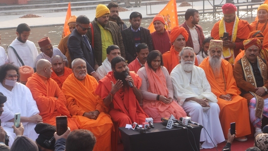 Various Sadhus and VVIPs reached Ayodhya on the eve of the consecration ceremony of the Ram Temple. In the picture, Yoga guru Ram Dev Baba holds the microphone. (Deepak Gupta/HT Photo)