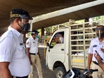 Traffic policemen checking vehicles during in Bengaluru. (Representative image)(ANI Photo) Traffic policemen checking vehicles during in Bengaluru. (Representative image)(ANI Photo)