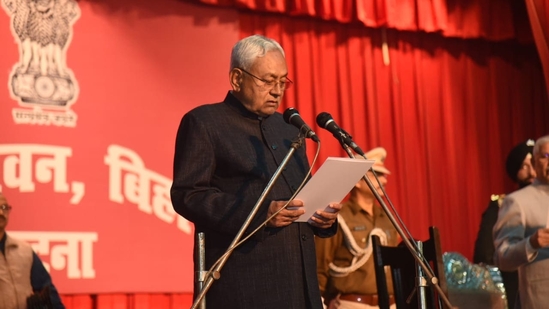Nitish Kumar on Sunday took the oath as the chief minister of Bihar for a record ninth time after resigning on the same day, breaking ties with Lalu Prasad Yadav's Rashtriya Janata Dal (RJD), and returning to the BJP-led NDA.(HT Photo/Santosh Kumar)