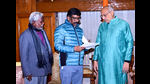Hemant Soren hands over his resignation to Jharkhand governor CP Radhakrishnan (right) as Champai Soren (left) looks on, in Ranchi on Wednesday. (PTI) Hemant Soren hands over his resignation to Jharkhand governor CP Radhakrishnan (right) as Champai Soren (left) looks on, in Ranchi on Wednesday. (PTI)