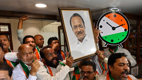 NCP party workers of Ajit Pawar group celebrate after Election commission granted them "Clock" and Party name , outside NCP party office, Mantaralaya, in Mumbai, India, on Tuesday, February 6, 2024. ((Photo by Anshuman Poyrekar/ Hindustan Times))