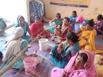 Rural women busy making jewellery and other items using Moonj grass in Mahewa area of Prayagraj. (HT File) Rural women busy making jewellery and other items using Moonj grass in Mahewa area of Prayagraj. (HT File)