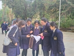 Students at La Martiniere discussing about their question paper with their friends after day 1 of the exam here in Lucknow Students at La Martiniere discussing about their question paper with their friends after day 1 of the exam here in Lucknow