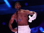 LAS VEGAS, NEVADA - FEBRUARY 11: Usher performs onstage during the Apple Music Super Bowl LVIII Halftime Show at Allegiant Stadium on February 11, 2024 in Las Vegas, Nevada. (Getty Images via AFP) LAS VEGAS, NEVADA - FEBRUARY 11: Usher performs onstage during the Apple Music Super Bowl LVIII Halftime Show at Allegiant Stadium on February 11, 2024 in Las Vegas, Nevada. (Getty Images via AFP)