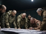 TOPSHOT - This handout photograph released on February 14, 2024 by the Press service of Ukrainian Armed Forces, shows Commander-in-Chief of the Armed Forces of Ukraine Oleksandr Syrsky (2nd L) and Ukraine's Defence Minister Rustem Umerov (L) visiting the frontline positions at an undisclosed location in eastern Ukraine. Newly appointed Ukrainian military chief said on February 14, 2024 that the situation on the front line was precarious, following a visit to positions near Avdiivka and Kupiansk. (Photo by Handout / Armed Forces of Ukraine / AFP) (AFP) TOPSHOT - This handout photograph released on February 14, 2024 by the Press service of Ukrainian Armed Forces, shows Commander-in-Chief of the Armed Forces of Ukraine Oleksandr Syrsky (2nd L) and Ukraine's Defence Minister Rustem Umerov (L) visiting the frontline positions at an undisclosed location in eastern Ukraine. Newly appointed Ukrainian military chief said on February 14, 2024 that the situation on the front line was precarious, following a visit to positions near Avdiivka and Kupiansk. (Photo by Handout / Armed Forces of Ukraine / AFP) (AFP)