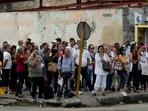 Cubans queue to enter the Spanish embassy in Havana on January 9, 2024. The US Customs and Border Protection agency said on January 27, 2024, that it had registered some 153,600 irregular entries from Cuba in 2023. Another 67,000 entered legally under a family reunification program introduced a year ago by the administration of Joe Biden.(AFP) Cubans queue to enter the Spanish embassy in Havana on January 9, 2024. The US Customs and Border Protection agency said on January 27, 2024, that it had registered some 153,600 irregular entries from Cuba in 2023. Another 67,000 entered legally under a family reunification program introduced a year ago by the administration of Joe Biden.(AFP)