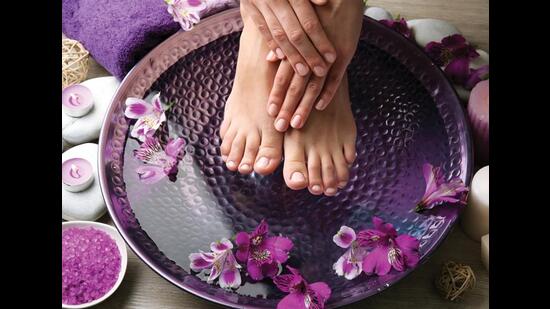Spring marks the time for winter feet to undergo the rigours of a pedicure after months spent encased in boots. (Adobe Stock)
