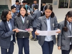 Students of City Montessori School, Lucknow branch discussing English literature question paper after the exam on Friday(Handout) Students of City Montessori School, Lucknow branch discussing English literature question paper after the exam on Friday(Handout)