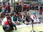 Farmers and Bharatiya Kisan Union (Tikait) activists jam the NH 58 at Mohiuddinpur in Meerut(HT photo) Farmers and Bharatiya Kisan Union (Tikait) activists jam the NH 58 at Mohiuddinpur in Meerut(HT photo)