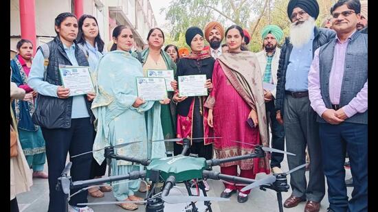 DC Sawhney hands over drones to four women, known as ‘Namo Drone Didis’ . (HT) DC Sawhney hands over drones to four women, known as ‘Namo Drone Didis’ . (HT)