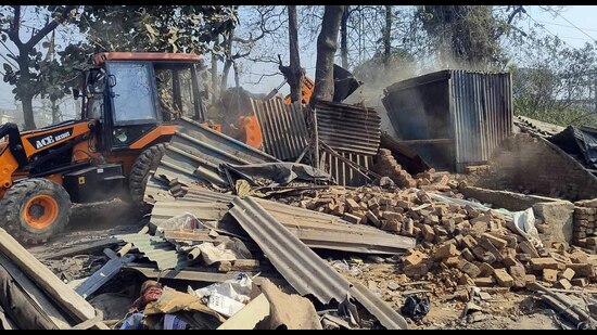 MC team demolishing illegal occupations in Ludhiana. (HT) MC team demolishing illegal occupations in Ludhiana. (HT)