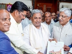 Karnataka State Permanent Backward Classes Commission chairman K Jayaprakash Hegde submitted a voluminous report on the caste survey to CM Siddaramaiah on Thursday. (ANI) Karnataka State Permanent Backward Classes Commission chairman K Jayaprakash Hegde submitted a voluminous report on the caste survey to CM Siddaramaiah on Thursday. (ANI)
