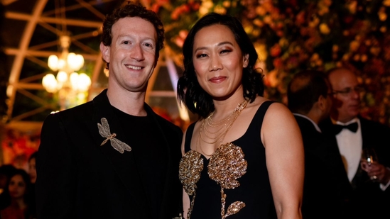 Mark Zuckerberg and Priscilla Chan at the party. The invitation says guests will start each day with a new dress code, with mood boards and an army of hair stylists, makeup artists and Indian wear designers at their hotel to help them prepare. 