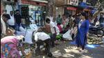 Hawkers clean up wet waste on VS Agashe Road in Dadar (Jeet Mashru) Hawkers clean up wet waste on VS Agashe Road in Dadar (Jeet Mashru)