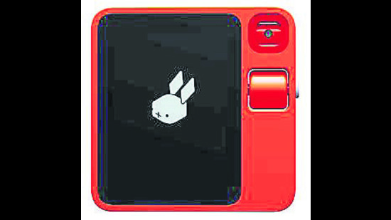 The Rabbit R1 is a square 3 inches wide. It can dangle on a keychain or sit in a pocket, and follows spoken instructions. The Rabbit R1 is a square 3 inches wide. It can dangle on a keychain or sit in a pocket, and follows spoken instructions.