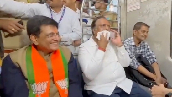 Piyush Goyal travels in Mumbai's local train(ANI) Piyush Goyal travels in Mumbai's local train(ANI)