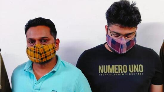 The two suspects in police custody. They were identified as Ajay Sharma (28) and Sanjay Jindal (38), both residents of Sonipat, Haryana. The two suspects in police custody. They were identified as Ajay Sharma (28) and Sanjay Jindal (38), both residents of Sonipat, Haryana.