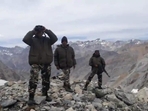 Indian soldiers tracking the movement of troops across the Line of Actual Control in China. Indian soldiers tracking the movement of troops across the Line of Actual Control in China.