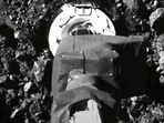 In this image taken from video released by NASA, the Osiris-Rex spacecraft touches the surface of Asteroid Bennu on Tuesday, Oct. 20, 2020.(NASA via AP) In this image taken from video released by NASA, the Osiris-Rex spacecraft touches the surface of Asteroid Bennu on Tuesday, Oct. 20, 2020.(NASA via AP)