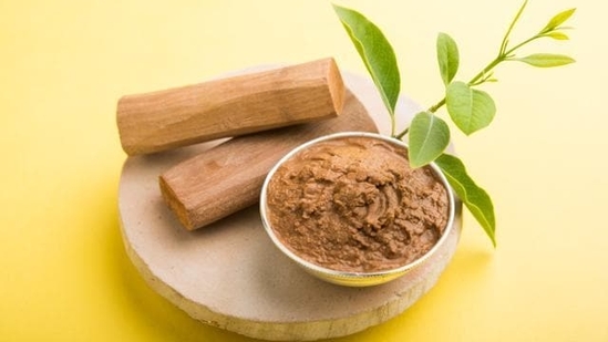 Sandalwood paste: Make a paste of sandalwood powder with water and apply it to the forehead. Sandalwood's cooling properties can help lower body temperature and provide relief from fever.(Shutterstock)