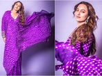 Sonakshi Sinha is currently busy promoting her upcoming series Heeramandi and her back to back promotional looks in exquisite ethnic wear are doing the rounds on social media. Just a few days ago, she turned heads in a blazer and flared pants ensemble embellished with orange mirrors, and this time, she stepped out in a purple Bandhani printed kaftan ensemble. With her incredible fashion sense and undeniable beauty, she continues to make her fans swoon. Her latest look oozing chic vibes is sure to inspire your ethnic wardrobe. (Instagram/@aslisona) Sonakshi Sinha is currently busy promoting her upcoming series Heeramandi and her back to back promotional looks in exquisite ethnic wear are doing the rounds on social media. Just a few days ago, she turned heads in a blazer and flared pants ensemble embellished with orange mirrors, and this time, she stepped out in a purple Bandhani printed kaftan ensemble. With her incredible fashion sense and undeniable beauty, she continues to make her fans swoon. Her latest look oozing chic vibes is sure to inspire your ethnic wardrobe. (Instagram/@aslisona)
