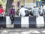 An image of daily wage workers sitting near Dandekar bridge in Pune during the pandemic awaiting work(Pratham Gokhale/HT Photo) An image of daily wage workers sitting near Dandekar bridge in Pune during the pandemic awaiting work(Pratham Gokhale/HT Photo)