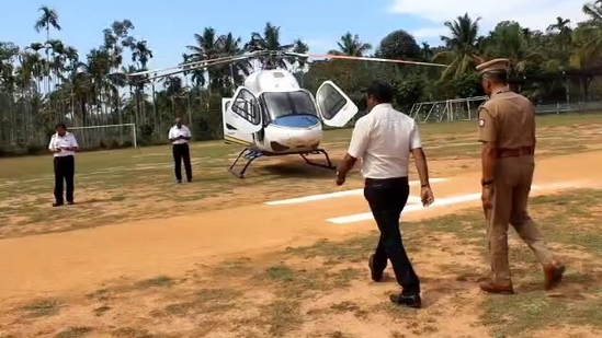 The helicopter via which Congress leader Rahul Gandhi arrived in Nilgiris, Tamil Nadu, was checked by the Election Commission's flying squad officials in Nilgiris.(ANI) The helicopter via which Congress leader Rahul Gandhi arrived in Nilgiris, Tamil Nadu, was checked by the Election Commission's flying squad officials in Nilgiris.(ANI)