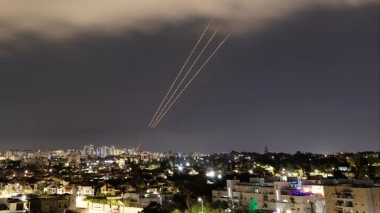 An anti-missile system operates after Iran launched drones and missiles towards Israel, as seen from Ashkelon, Israel.(Reuters) An anti-missile system operates after Iran launched drones and missiles towards Israel, as seen from Ashkelon, Israel.(Reuters)