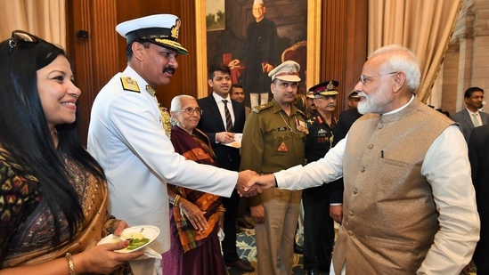 Prime Minister Narendra Modi and Vice Admiral Dinesh Tripathi. Prime Minister Narendra Modi and Vice Admiral Dinesh Tripathi.