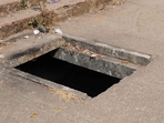 A man saved his life by jumping into a nearby open sewer manhole when his moving car suddenly caught fire in Gurugram on Saturday afternoon, said police. (Representational picture)(File photo) A man saved his life by jumping into a nearby open sewer manhole when his moving car suddenly caught fire in Gurugram on Saturday afternoon, said police. (Representational picture)(File photo)