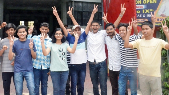 Students of Lohia Nagar Mount Carmel School in Patna celebrates after CISCE 10th, 12th results are announced. (Santosh Kumar/HT Photographer )