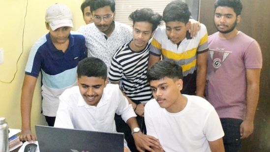 Students of Lohia Nagar Mount Carmel School in Patna check results on computer after announcement of ICSE, ISC results 2024.(Santosh Kumar /HT Photographer )