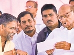 Nilesh Lanke with Sharad Pawar during a rally in Shevgaon on April 28. Nilesh Lanke with Sharad Pawar during a rally in Shevgaon on April 28.
