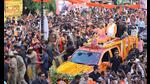Prime Minister Narendra Modi with UP CM Yogi Adityanath during a road show in Varanasi on Monday. (HT Photo) Prime Minister Narendra Modi with UP CM Yogi Adityanath during a road show in Varanasi on Monday. (HT Photo)