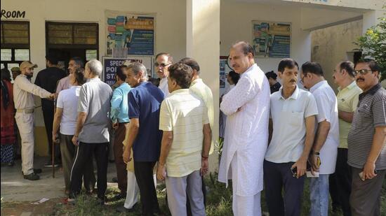 Kashmiri Pandits stand in a queue to cast their vote during the fourth phase of Lok Sabha elections at Roopnagar in Jammu. (PTI) Kashmiri Pandits stand in a queue to cast their vote during the fourth phase of Lok Sabha elections at Roopnagar in Jammu. (PTI)
