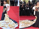 Aishwarya Rai Bachchan makes a glamorous appearance at Cannes 2024 in a custom black and white gown adorned with stunning gold details.(Instagram) Aishwarya Rai Bachchan makes a glamorous appearance at Cannes 2024 in a custom black and white gown adorned with stunning gold details.(Instagram)