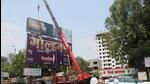 PCMC on Monday pulled down five illegal hoardings, officials said. (HT) PCMC on Monday pulled down five illegal hoardings, officials said. (HT)