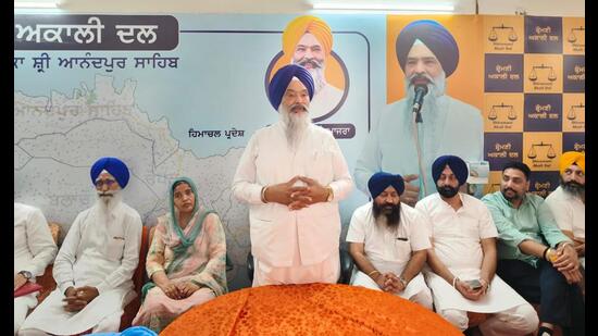 SAD candidate Prem Singh Chandumajra addressing senior leaders of the party in Mohali on Friday. (HT Photo)