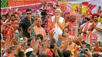 Prime Minister Narendra Modi and chief minister Yogi Adityanath during a road show in Varanasi on May 13. (AFP File Photo) Prime Minister Narendra Modi and chief minister Yogi Adityanath during a road show in Varanasi on May 13. (AFP File Photo)