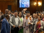 Nepalese Prime Minister Pushpa Kamal Dahal waves to media after winning a vote of confidence in parliament in Kathmandu, Nepal, Monday, May 20, 2024. Dahal will continue leading his shaky governing coalition after winning his fourth vote of confidence in two years on Monday. (AP/PTI)(AP05_20_2024_000230B)(AP) Nepalese Prime Minister Pushpa Kamal Dahal waves to media after winning a vote of confidence in parliament in Kathmandu, Nepal, Monday, May 20, 2024. Dahal will continue leading his shaky governing coalition after winning his fourth vote of confidence in two years on Monday. (AP/PTI)(AP05_20_2024_000230B)(AP)